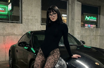 Prompt:Midnight Encounter: Her, the Porsche & the Neon Glow